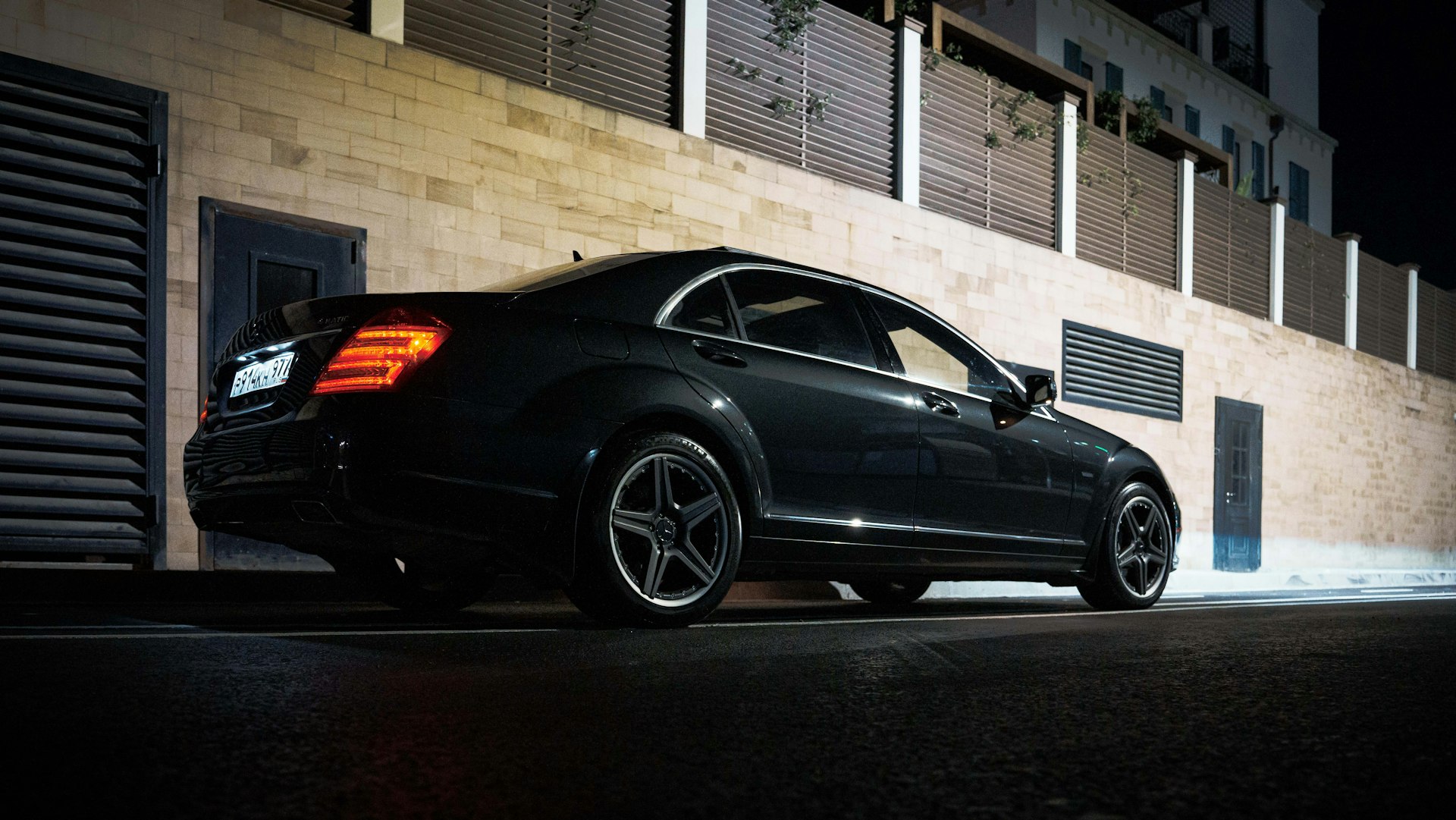 SK Limo luxury sedan at night